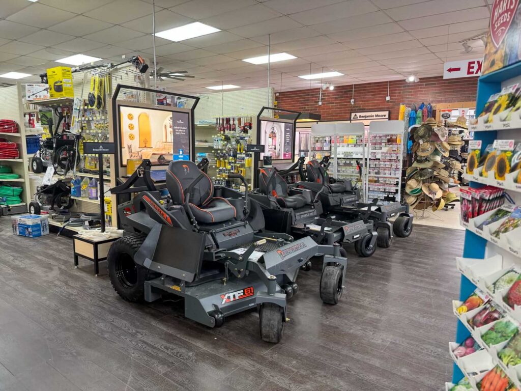 Spartan zero turn lawn mowers displayed inside George's Paint & Hardware in Hayesville NC