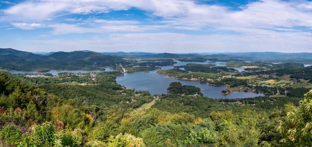 Panoramic view of Lake Chatuge surrounded by the Blue Ridge Mountains during summer in Western North Carolina